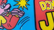 NINTENDO DONKEY KONG JUNIOR Arcade Game Plexiglass Header (8) 